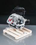 Chevy LS turbo engine lego model on wooden pallet side view