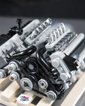 BMW E60 E63 M5 M6 S85 engine lego model on wooden pallet close up of itb
